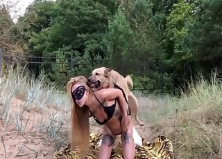 Dog humps blonde beauty in outdoor cam scenes and comes inside her