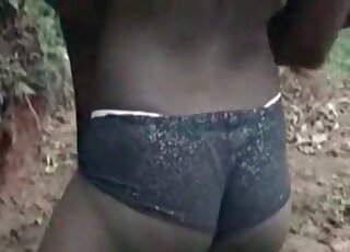 Curvy ebony slut performs a passionate blowjob to a horse
